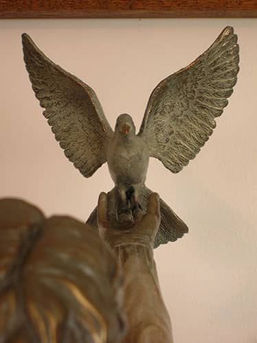 Portrait bronze sculptures. Domestic white dove of Peace bronze sculpture
