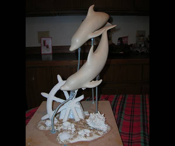 Marine life bronze sculptures. Dolphins bronze sculptures | www.donbeckbronzes.com